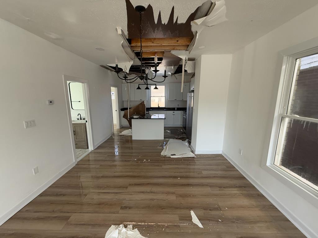 Kitchen view of ceiling drywall damage due to flooding